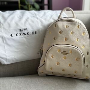 COACH Carrie Backpack 23 with apple print